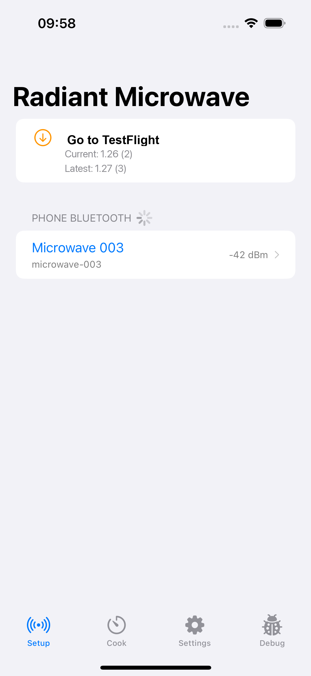 iPhone Setup tab showing a version check notice above a nearby microwave row
